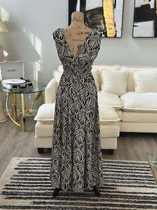 Indulge in Style Black and White Leaf Print Smocked Maxi Dress - Picture 4 of 7
